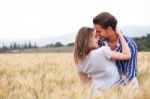 Couple Smiling Eachother Stock Photo