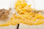 Italian Pasta Penne With Wheat Stock Photo