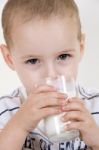 Little Boy Drinking Milk Stock Photo