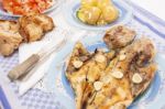 Grilled European Seabass With Potato And Tomato Salad Stock Photo