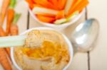 Fresh Hummus Dip With Raw Carrot And Celery Stock Photo