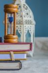 Hourglass On A Book Stock Photo