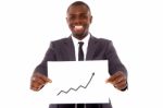 Businessman With Chart Stock Photo