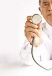 Doctor Holding Stethoscope Stock Photo