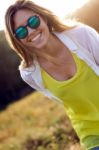 Beautiful Young Woman Enjoying Summer In A Field Stock Photo