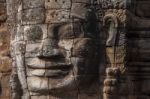 Ancient Stone Face Of Bayon Temple Stock Photo