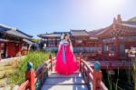 Woman With Hanbok In Gyeongbokgung,the Traditional Korean Dress Stock Photo