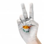 Cyprus Flag On victory Hand Stock Photo