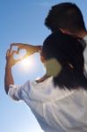 Young Couple Having Fun In A Park Stock Photo