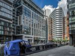 Wide Beamed Boat In Paddington Basin Stock Photo