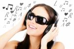 Female Listening To Music Stock Photo