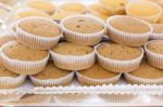 Brown Cupcakes On Silver Tray In A Hotel Restaurant Served For B Stock Photo