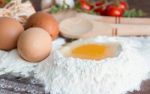 Ingredients Preparation Spaghetti With Eggs, Tomatoes Herbs And Spices Stock Photo