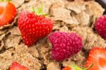 Bran Flakes With Fresh Raspberries And Strawberries Stock Photo