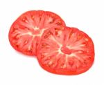 Slice Of Tomato Isolated On White Background Stock Photo