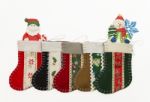 Arrange Of Christmas Sock With Santa And Snow Man Stock Photo