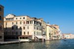 Motorboat Cruising Down The Grand Canal In Venice Stock Photo