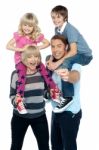 Kids Having A Good Time With Their Parents Stock Photo