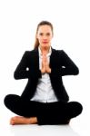 Businesswoman Doing Yoga Stock Photo