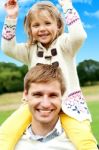 Father And Daughter In Outdoors Stock Photo