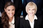 Smiling Female Executives At Office Stock Photo