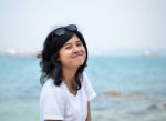 Young Beautiful Girl On The Seaside Stock Photo