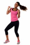 Excited Young Female Fitness Trainer Stock Photo