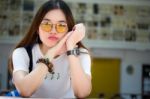 Portrait Of Thai Chinese Adult Glasses Beautiful Girl Denim Blue Bag Relax And Smile Stock Photo