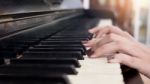 Close-up Of A Music Performer's Hand Playing The Piano Stock Photo