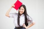 Asia Thai High School Student Uniform Beautiful Girl Read A Book Stock Photo