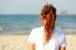 Woman Looking To The Sea Stock Photo