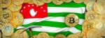 Bitcoins Gold Around Abkhazia  Flag And Pickaxe On The Left.3d I Stock Photo