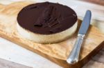 Fresh Classic Homemade Cheesecake With Dark Chocolate Topping Stock Photo