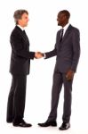 Businessmen Shaking Hands Stock Photo