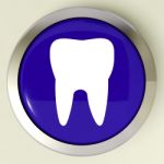 Tooth Button Means Dental Appointment Or Teeth Stock Photo