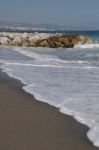 Puerto Banus Beach And Stone Pier Stock Photo