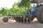 Plow Tractor Close Up On Field Stock Photo