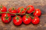 Fresh Cherry Tomatoes On A Cluster Stock Photo