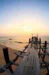 Bridge To Sea At Sunset Stock Photo