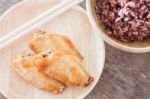 Grilled Chicken Wings With Multi Grains Berry Rice Stock Photo