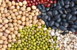 Various Colorful Dried Legumes Beans As Background Stock Photo