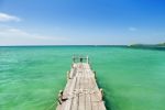 Wood Bridge To The Sea Stock Photo