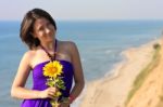 Happy Smiling White Girl On The Seaside Stock Photo