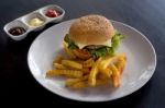 Burger And Fries With Ketchup Stock Photo