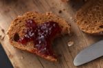 Dark Multigrain Bread Whole Grain And Jam Fresh Baked On Rustic Closeup Stock Photo