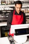 Barista Staff At The Cash Counter Stock Photo