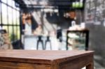 Selected Focus Empty Brown Wooden Table And Coffee Shop Or Resta Stock Photo