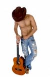 Man In Cowboy Hat Holding Guitar Stock Photo