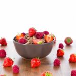 Bran Flakes With Fresh Raspberries And Strawberries Stock Photo