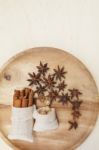 Dry Herbs In Canvas Bag On Round Wooden Tray Stock Photo